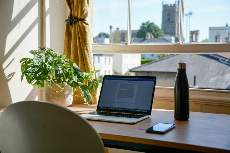 Person working at a computer in a home office