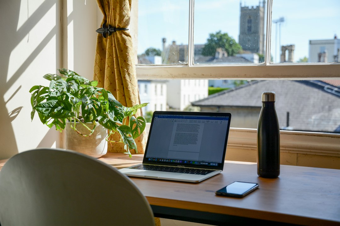 Person working at a computer in a home office